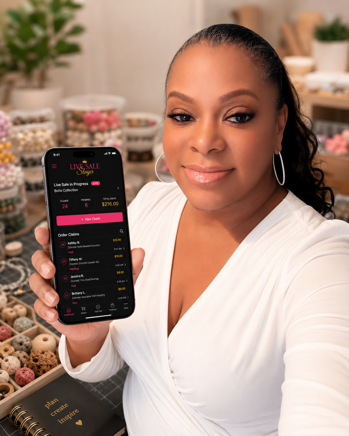 Crystal Lauren Cornell showing the Live Sale Slayer app on her phone
